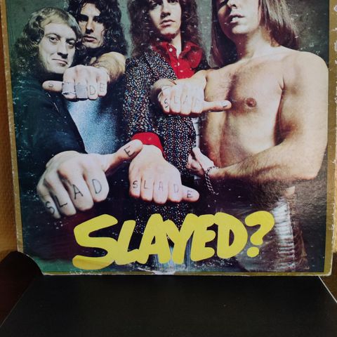 SLADE Slayed?