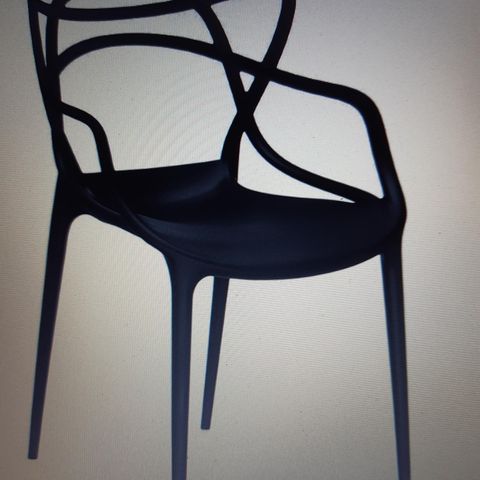 1 svart Kartell  spisestol