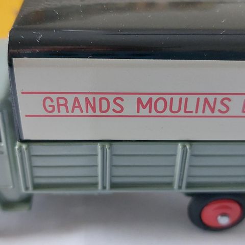 Atlas Dinky Toys 25 JV, Ford lastebil med plan, "Grans Moulins de Paris"