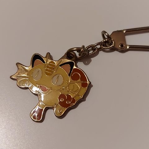 Meowth Medal Swing