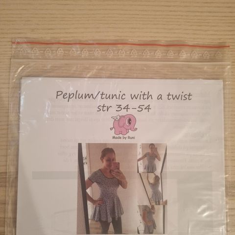 Peplum/tunic with a twist str 34-54