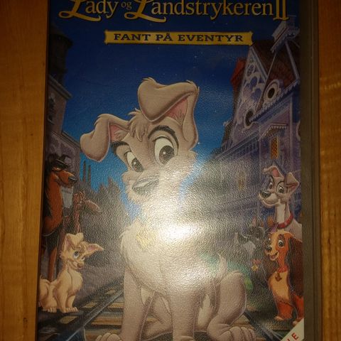 Walt Disneys - Lady og Landstrykeren 2-fant på eventyr ". VHS