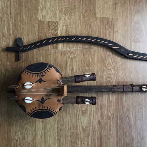 afrikansk instrument pynt 