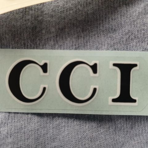 CCI emblem sidedeksel  moped mc SUZUKI