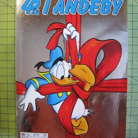 Walt Disney's 40 år i Andeby - Se bilder og tekst.