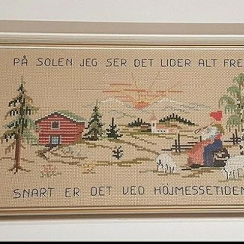 Brodert, koselig bilde. Snart er det ved højmessetiden.