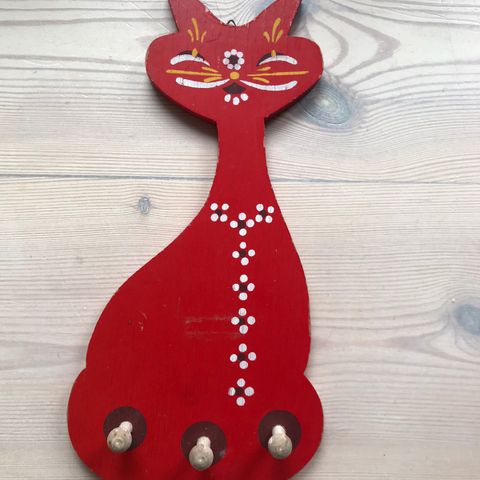 Sjarmerende knaggrekke katt rød