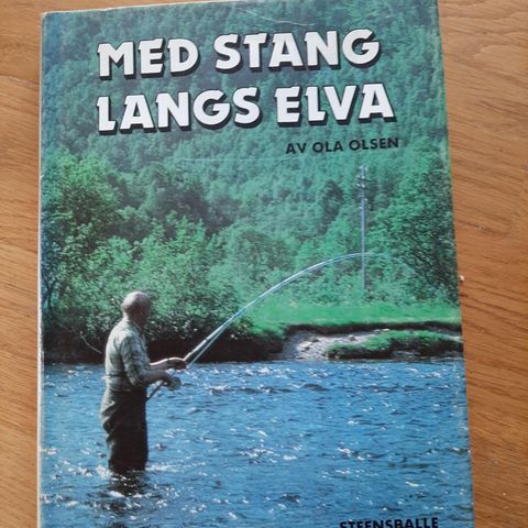 Med stang langs elva