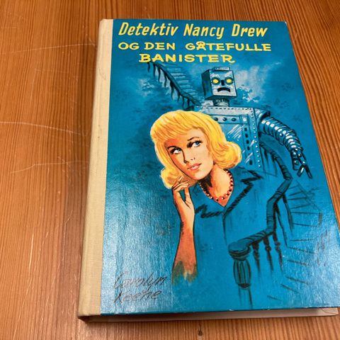 Carolyn Keene : DETEKTIV NANCY DREW OG DEN GÅTEFULLE BANISTER - Nr. 50