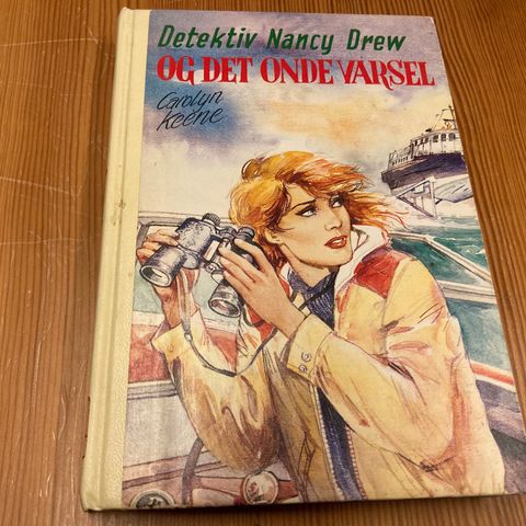 Carolyn Keene : DETEKTIV NANCY DREW OG DET ONDE VARSEL - Nr. 71