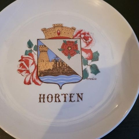 Hortens platte med byvåpen