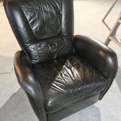 Recliner skinnstol.