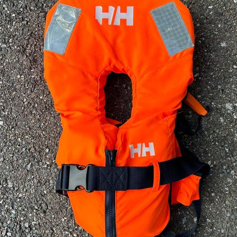 Pent og knapt brukt Helly Hansen flytevest 10-25kg