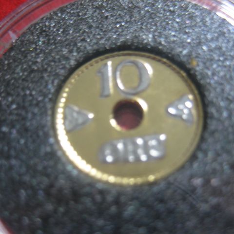 10 øre 1938 belagt med 24 karat gull og platina