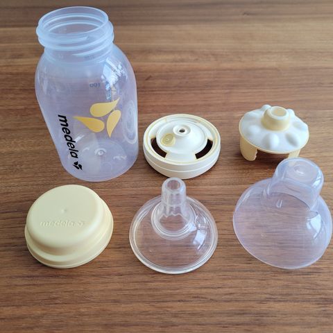 (Lite brukt) Medela calma smokk + flaske 150ml (1sett)