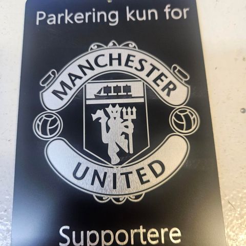 Manchester united parkeringskilt.