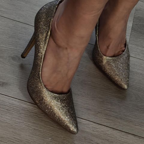 Shiny golden pointy shoes from New Look