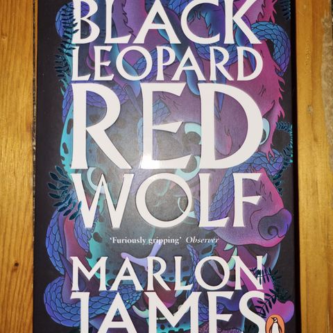 Black leopard, red wolf