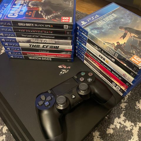 ps4 pro 1TB + 16 spill