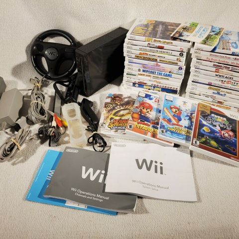 Gammel Nintendo Wii eller spill som ligger og flyter? Jeg henter det gjerne