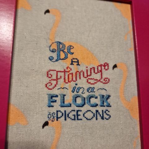 Geriljabroderi "Be a flamingo in a flock of pigeons".
