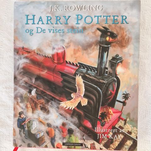 HARRY POTTER og De vises stein, av J.K. Rowling.