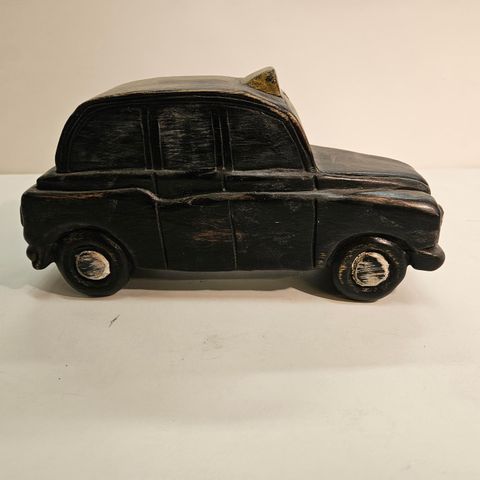 Vintage wooden taxi toy.