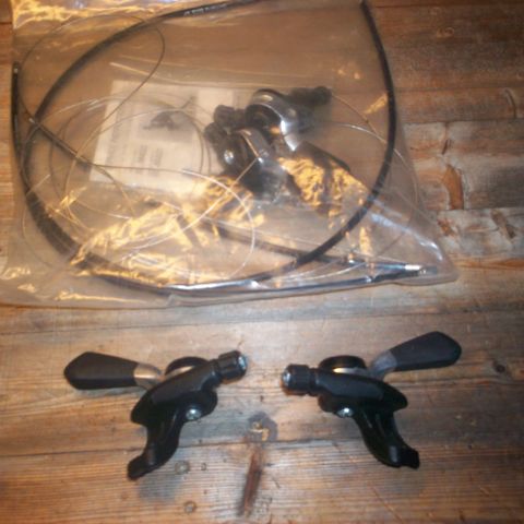 NOS Shimano Mountain LX thumbies.