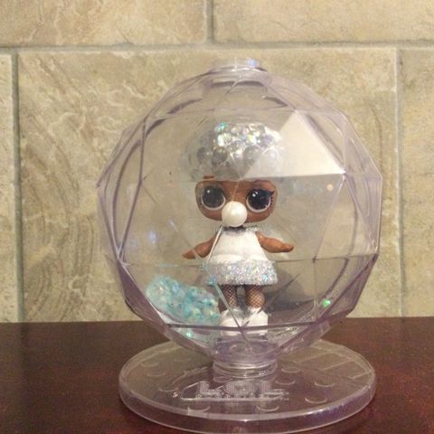 L.O.L. Surprise! Glitter Globe Doll Winter Disco Series with Glitter Hair.