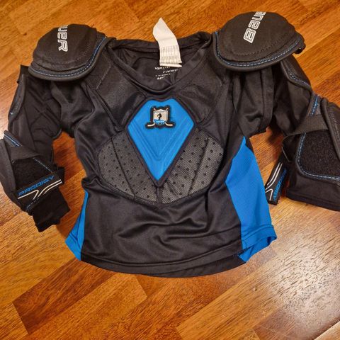 Hockey Bauer  Protective  Combo with pants,  fits a 6 to a 8 years old