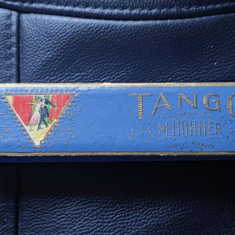 Vintage Hohner Tango harmonica.