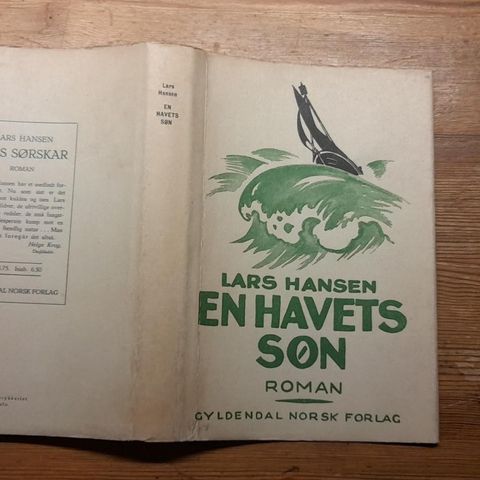 Lars Hansen. 1928: En havets søn. Originalbind med VAREOMSLAG.