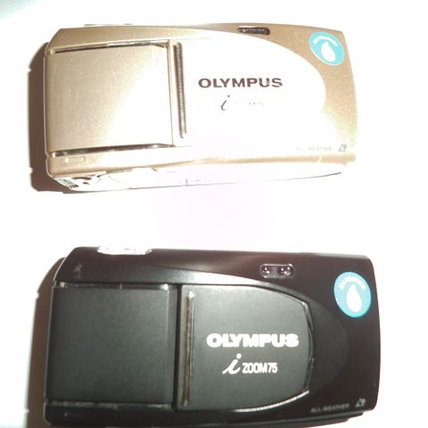 Olympus  i zoom 75! Trengs APS-film til dette kameraet. Ny pris!