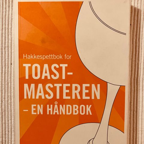 BokFrank: Ellen Glad; hakkespettbok for toastmasteren - en håndbok (2004)