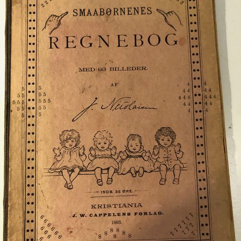 Smaabørnenes regnebok. Med Billeder. Førsteutgave 1893. J. Nicolaisen