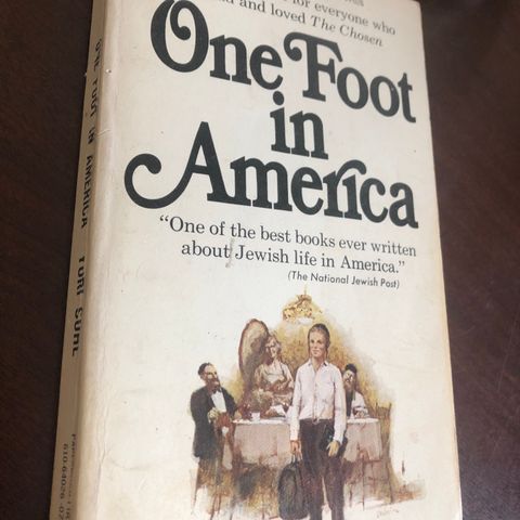 One foot in America.