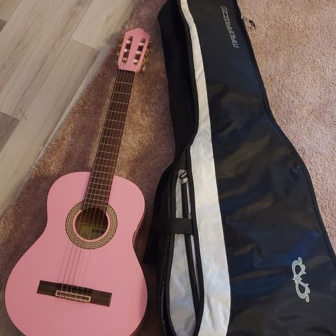 Rosa gitar med bag
