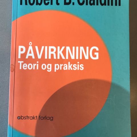 Påvirkning - teori og praksis av Robert B. Cialdini