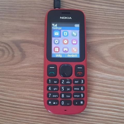 Retro mobiltelefon Nokia 100 i rose farge