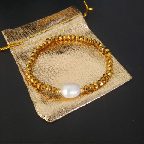 Armbånd med ekte perle