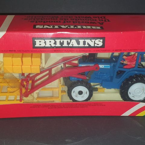 9584 Britains Ford 7710 Traktor modell med frontlesser og utstyr