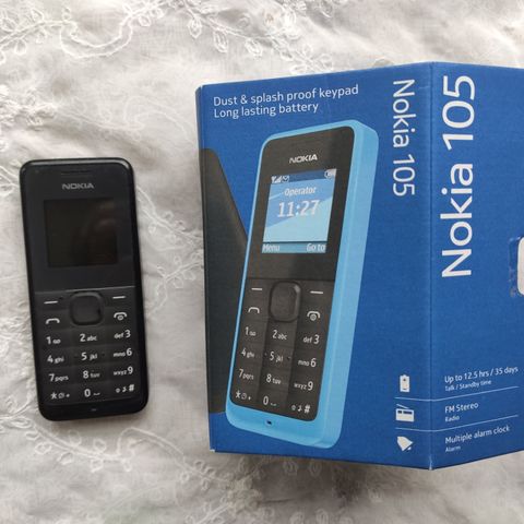 Nokia mobiltelefon m/lader selges kr 400,00 innklusiv frakt