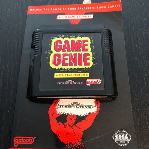 Game Genie til Sega Mega Drive med skandinavisk bok!