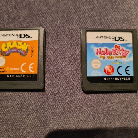 Nintendo DS spill Hello Kitty og Crash Mind over Mutant selges 100 per stk