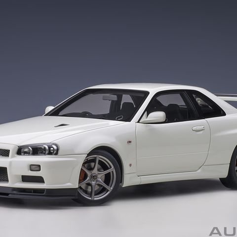 Nissan Skyline GT-R (R34) V-spec II (White Pearl) AUTOart 77406 skala 1:18