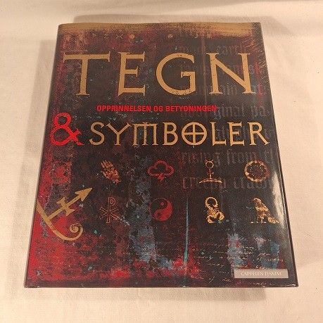 Tegn & symboler – opprinnelsen og betydningen – Bruce-Mitford og Wilkinson