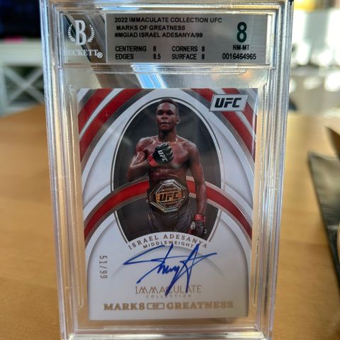 2022 Panini UFC Immaculate ISRAEL ADESANYA Marks of Greatness Autograf /99 BGS 8