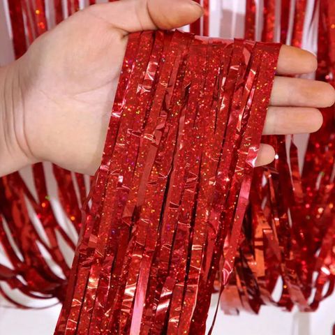 Foil fringe curtains red