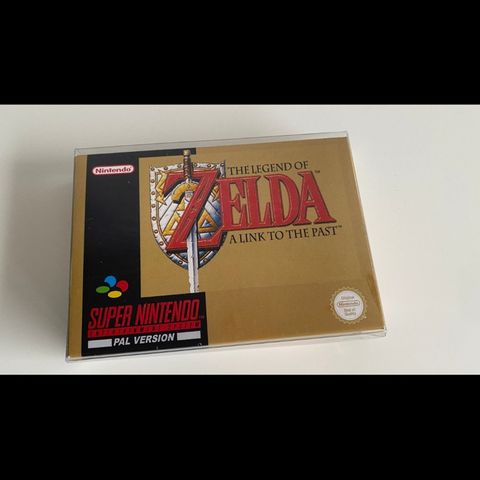 The Legend of Zelda: A link to the Past til SNES med reprodusert eske.