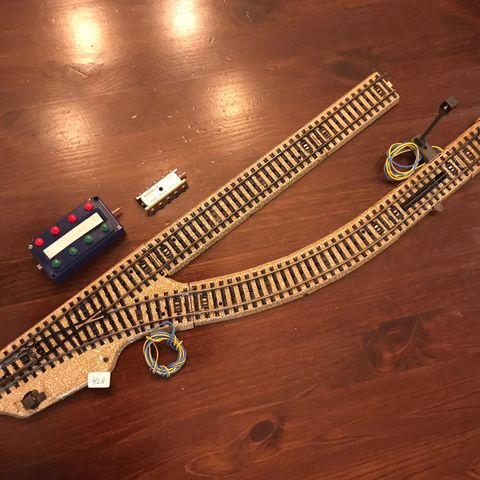 Märklin sidespor med Avkoblingsskinne og Stoppbukk H0